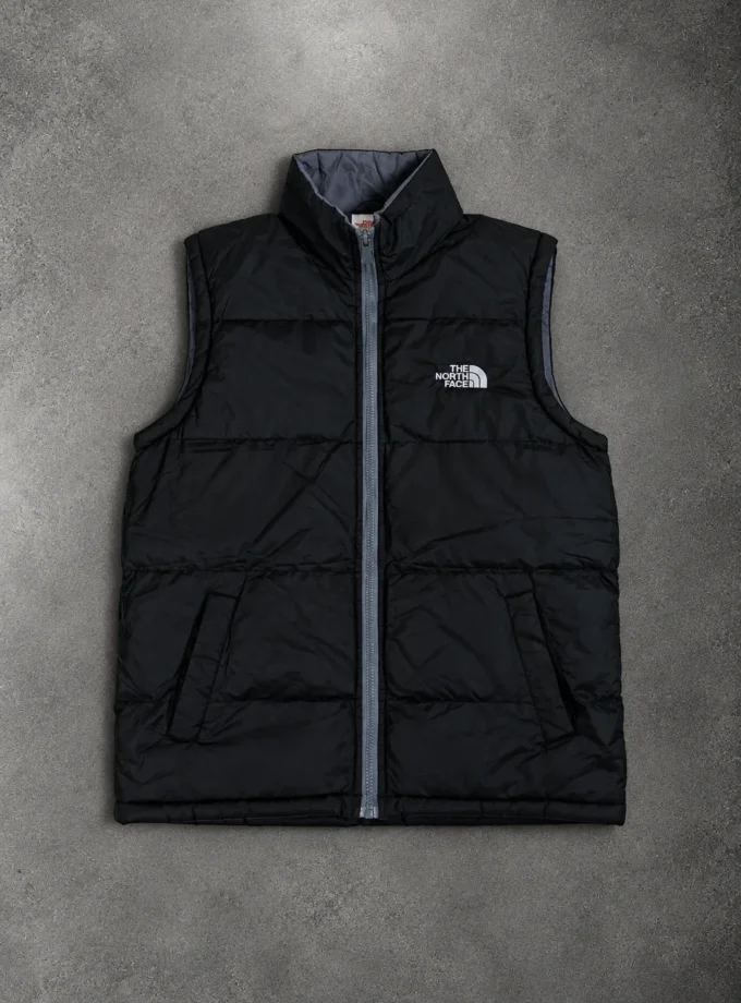 The North Face black puffer vest size M
